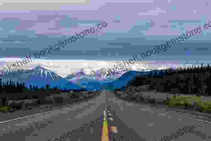 A Picturesque Landscape Image Of The Alcan Highway, Showcasing The Rugged Mountains And Vast Wilderness That Surrounds It. A Lap Around Alaska: An AlCan Adventure (A Lap Around 2)