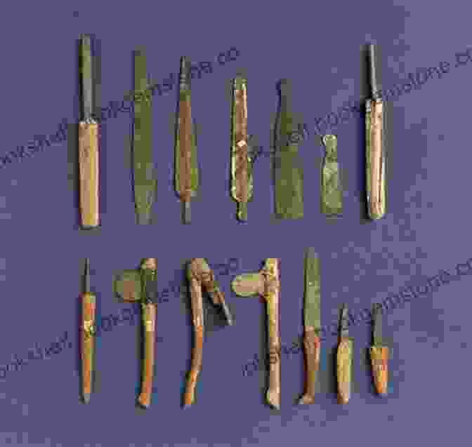 A Variety Of Ancient Egyptian Tools, Including Chisels, Saws, Hammers, And Measuring Instruments, Displayed On A Wooden Surface. Lost Ancient Technology Of Egypt
