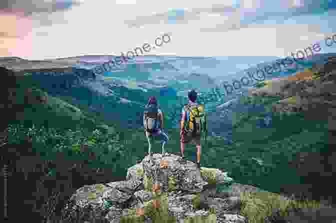 Hikers Standing Atop A Rocky Outcrop, Overlooking The Vast Lake Windermere With The Snow Capped Purcell Mountains In The Background Mountain Footsteps: Hikes In The East Kootenay Of Southeastern British Columbia 4th Edition