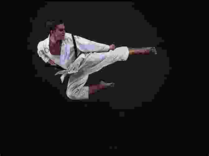 Taekwondo Athletes Performing A Flying Kick Taekwondo (Science Behind Sports)